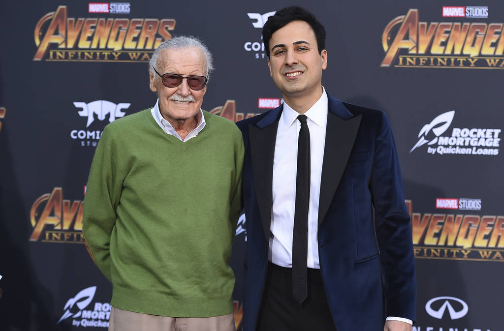 Stan Lee, left, and Keya Morgan arrive at the world premiere of "Avengers: Infinity War" in Los Angeles in April 2018. (Photo by Jordan Strauss/Invision/AP, File)