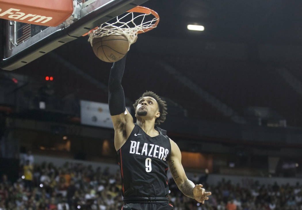 Trail Blazers guard Gary Trent Jr. (9) converts a fast break dunk in the second quarter during Portland's NBA Summer League finals game with the Los Angeles Lakers on Tuesday, July 17, 2018, at th ...