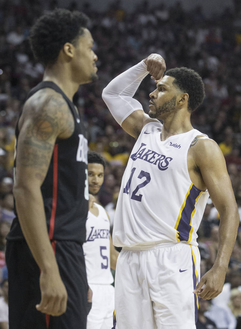 Lakers forward Jeff Ayres (12) flexes after getting fouled on the way to the basket during Los Angeles' Summer League finals game with the Portland Trail Blazers on Tuesday, July 17, 2018, at the ...