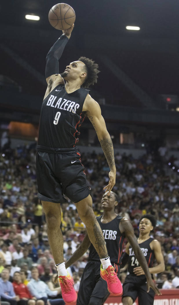 Trail Blazers guard Gary Trent Jr. (9) converts a fast break dunk in the second quarter during Portland's NBA Summer League finals game with the Los Angeles Lakers on Tuesday, July 17, 2018, at th ...