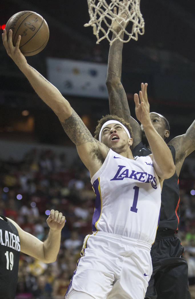 Los Angeles Lakers guard Stephaun Branch (1) drives past Portland Trail Blazers guard Archie Goodwin (70) in the fourth quarter during the NBA Summer League finals on Tuesday, July 17, 2018, at th ...