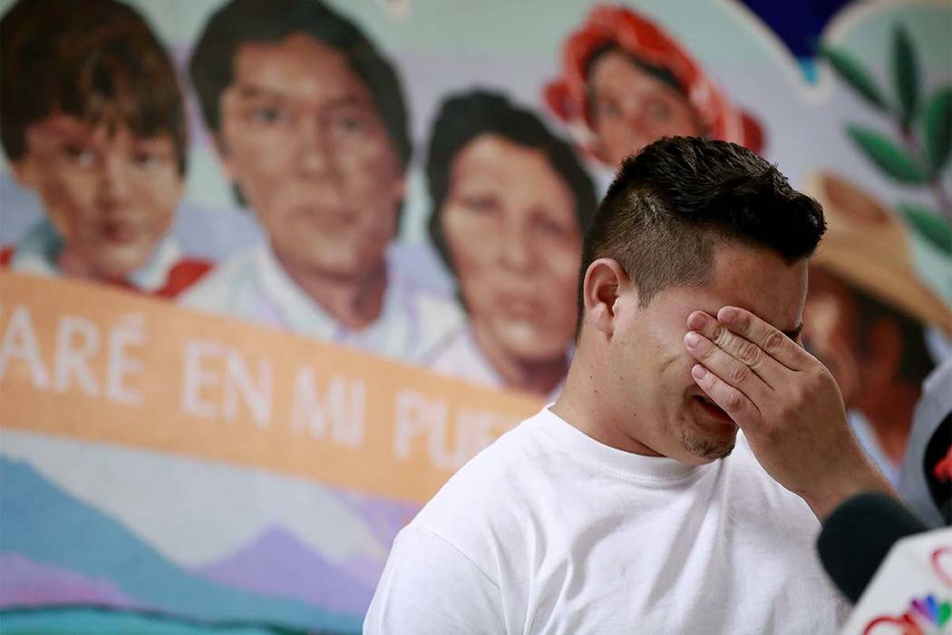 In this June 25, 2018 file photo, Christian, from Honduras, recounts his separation from his child at the border during a news conference at the Annunciation House, in El Paso, Texas. (Matt York/ ...