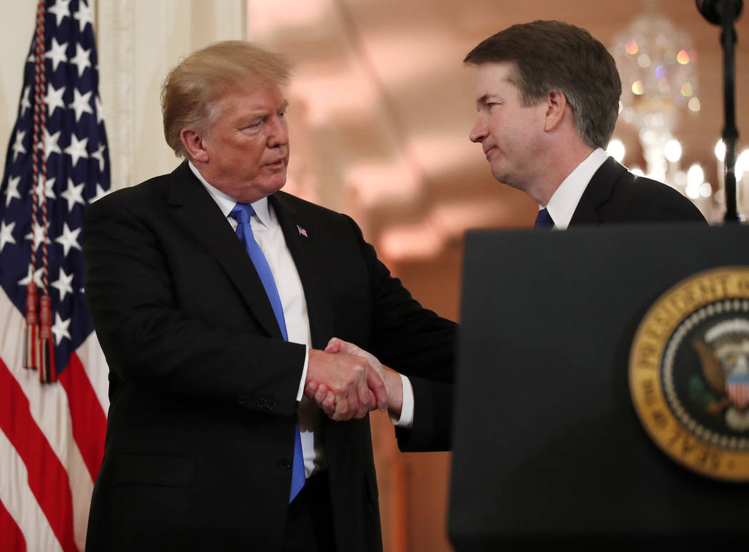 President Donald Trump shakes hands with Judge Brett Kavanaugh his Supreme Court nominee, in the East Room of the White House, Monday, July 9, 2018, in Washington. (AP Photo/Alex Brandon)