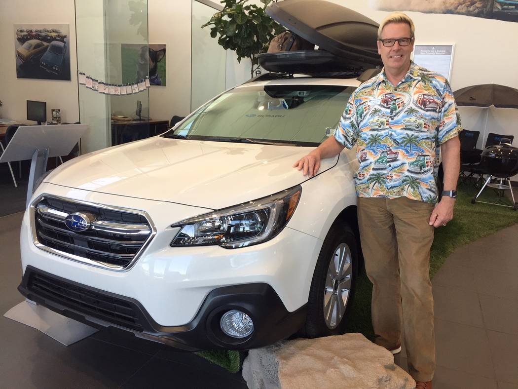 Subaru of Las Vegas general manager Burton Hughes is seen with a 2018 Outback at the dealership at 6455 Roy Horn Way.