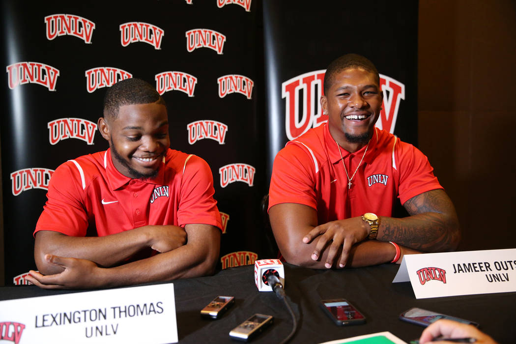 UNLV's Lexington Thomas, left, and Jammer Outsey are interviewed during the Mountain West Conference football media day at the Cosmopolitan hotel-casino in Las Vegas, Wednesday, July 25, 2018. Eri ...