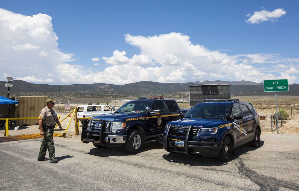 Law enforcement officials guard the entrance to Ely State Prison in Ely on Wednesday, July 11, 2018. Chase Stevens Las Vegas Review-Journal @csstevensphoto
