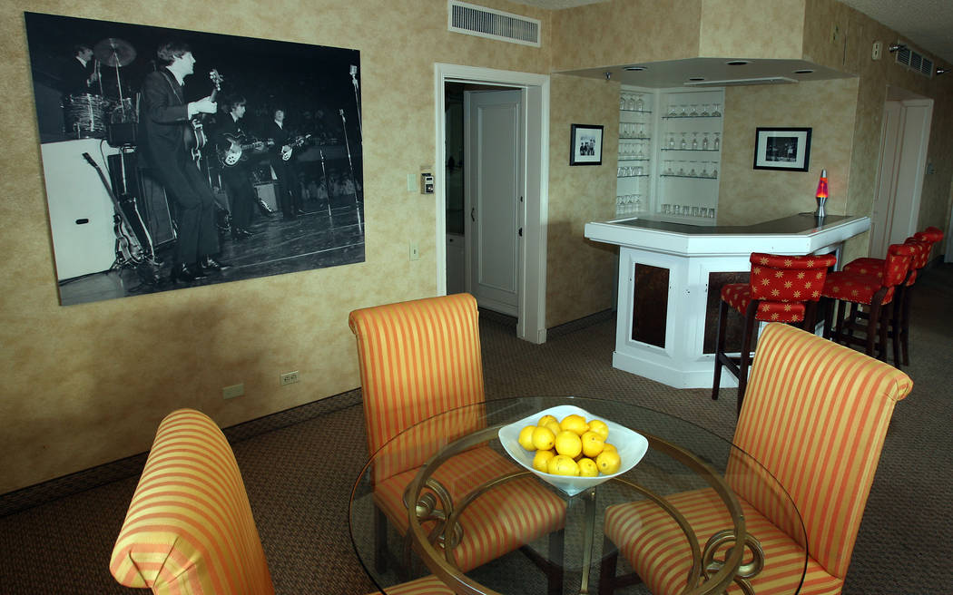 The dining room and bar area of room 2344 at the Sahara hotel-casino, known as The Beatles Suit ...