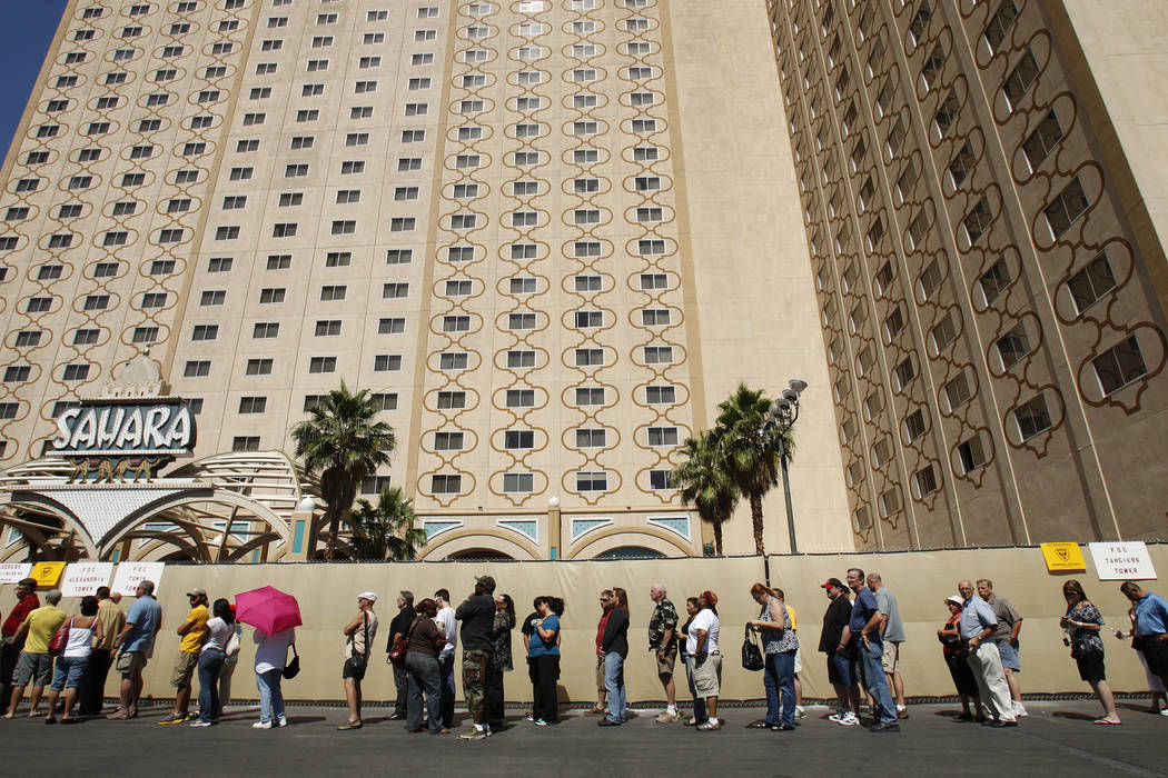 People line up outside of the Sahara hotel-casino before the start of a liquidation sale on ite ...