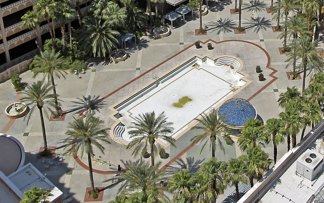 The Sahara hotel-casino pool sits empty in 2011, missing lounge chairs, most sold during the sa ...