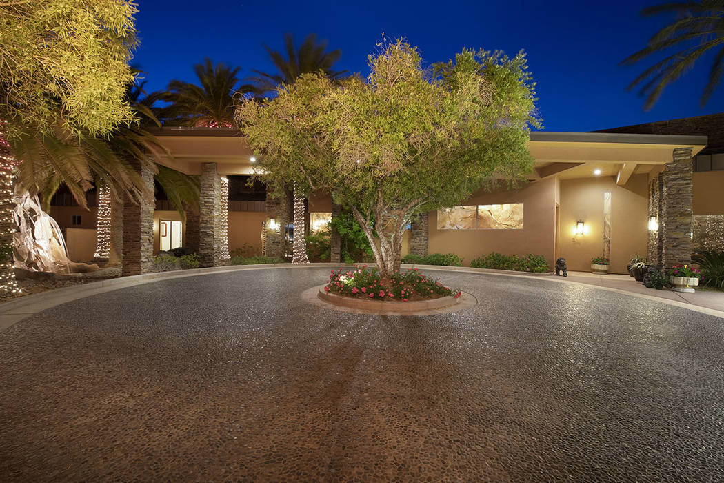 The home has a circular driveway. (Synergy/Sotheby’s International Realty)