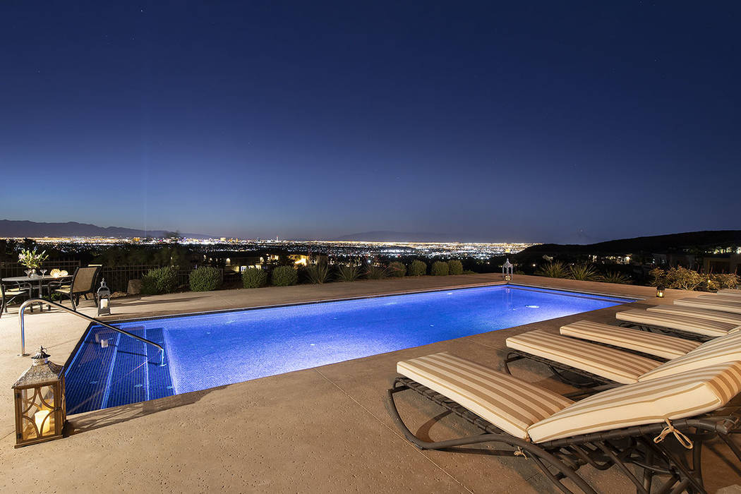 Strip views by the pool. (Synergy/Sotheby’s International Realty)