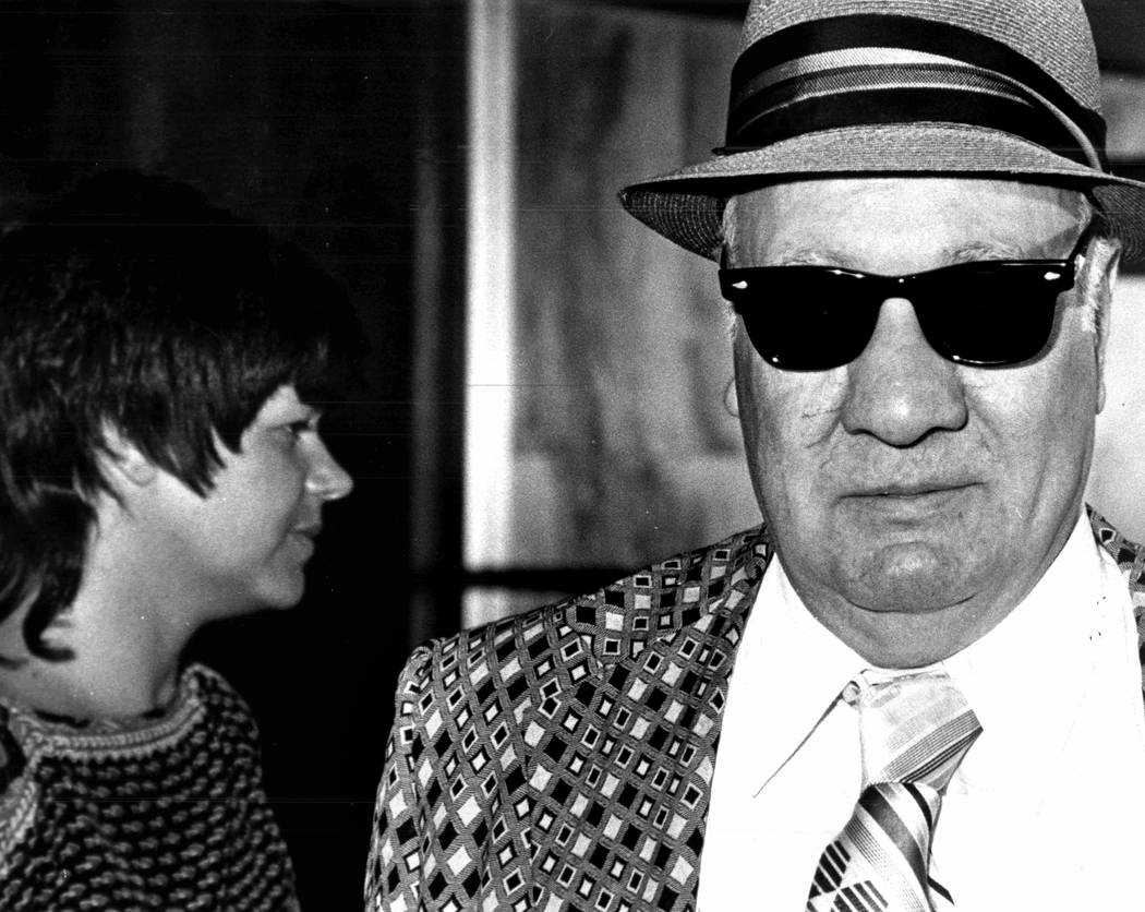 About 1982, federal court reporter Jane Ann Morrison looks away from the jacket worn by then-Teamsters Union official Joseph Talerico, who was granted immunity in the Stardust skimming case, but w ...
