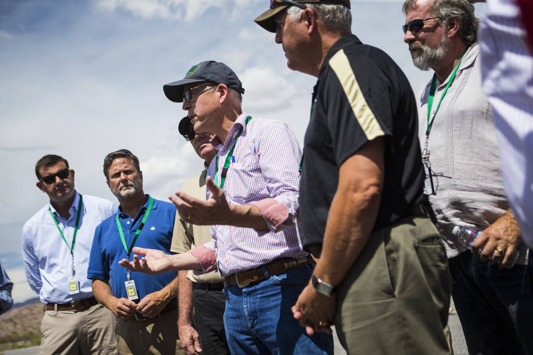 U.S. Rep. Greg Walden, R-Ore., center, speaks during a congressional tour of Yucca Mountain near Mercury on Saturday, July 14, 2018. Chase Stevens Las Vegas Review-Journal @csstevensphoto