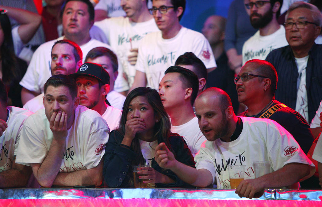John Cynn's supporters nervously wait for the call on day three of the main event final table at the World Series of Poker tournament at the Rio Convention Center in Las Vegas, Saturday, July 14, ...