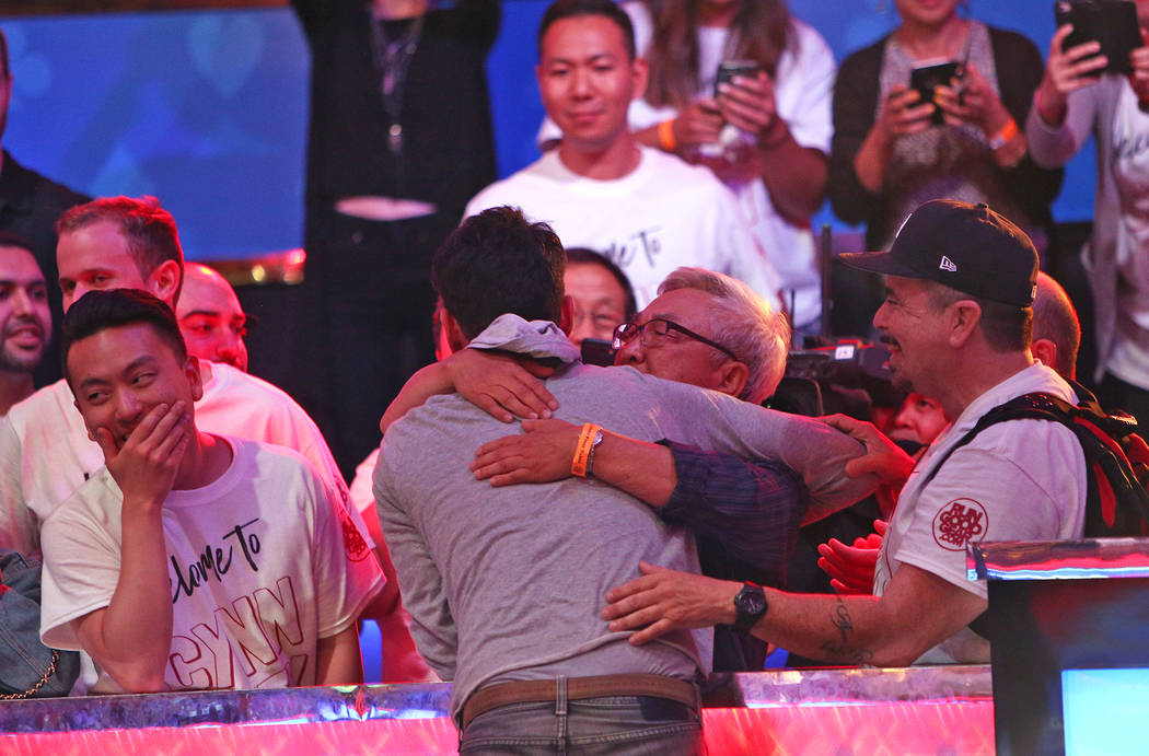 John Cynn hugs his father Sang Cynn after winning the World Series of Poker tournament in Las Vegas, Sunday, July 15, 2018. Rachel Aston Las Vegas Review-Journal @rookie__rae