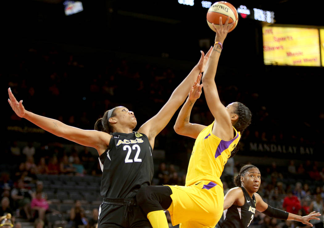 Las Vegas Aces center A'ja Wilson (22) blocks Los Angeles Sparks