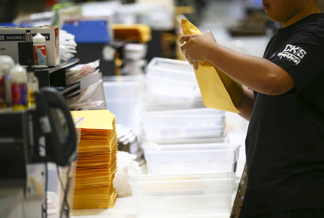 Justin Abellera packs up items to be shipped at the eCig Distributors warehouse near McCarran International Airport in Las Vegas on Friday, July 13, 2018. Chase Stevens Las Vegas Review-Journal @c ...