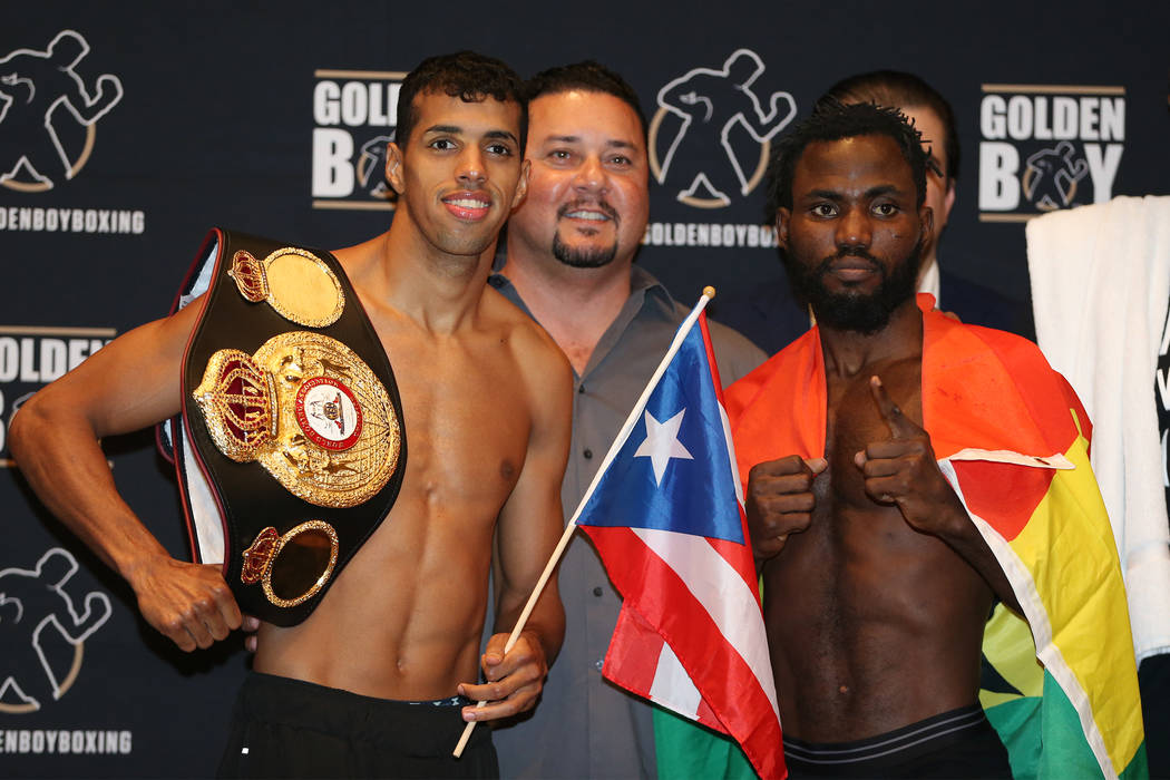 Alberto Machado, left, and Rafael Mensah during their official weigh-in event at the Hard Rock Hotel in Las Vegas, Friday, July 20, 2018. Machado and Mensah are fighting for the WBA Super Featherw ...