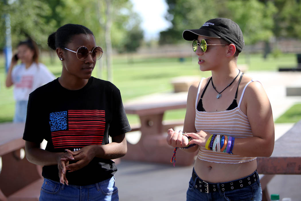Ariel Hobbs, left, and Emma Gonzales speak at a Road to Change Voter Registration Walk at Sunset Park in Las Vegas, Monday, July 16, 2018. The event was put on by the March For Our Lives group, cr ...