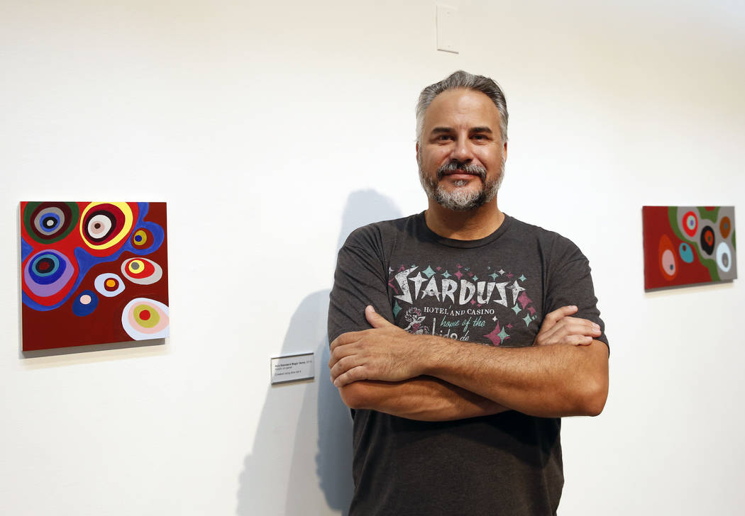 The Las Vegas artist, Jerry Misko, poses for photo at The Studio at Sahara West Library where his art work is displayed for his show, "Polyhedral" on Monday, July 16, 2018, in Las Vegas. ...