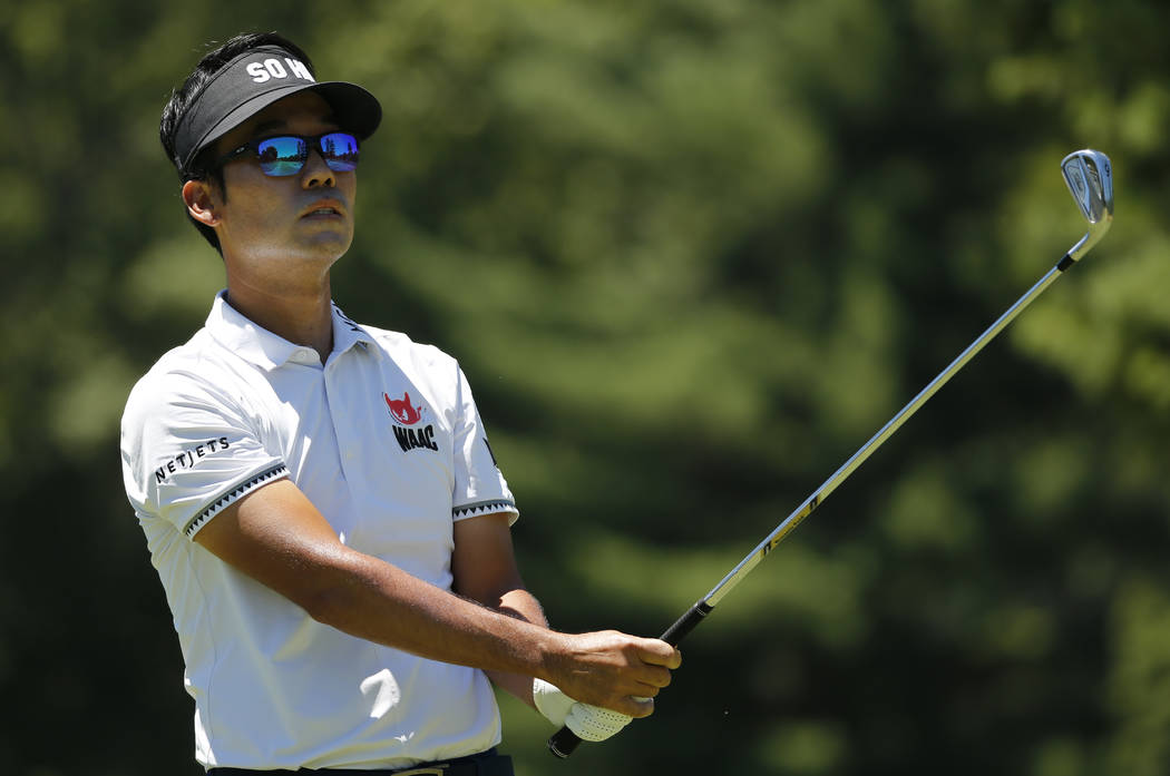 Kevin Na watches his tee shot on the third hole during the final round of the Military Tribute PGA Tour Golf Tournament at the Greenbrier in White Sulphur Springs, W. Va., Sunday, July 8, 2018. (A ...