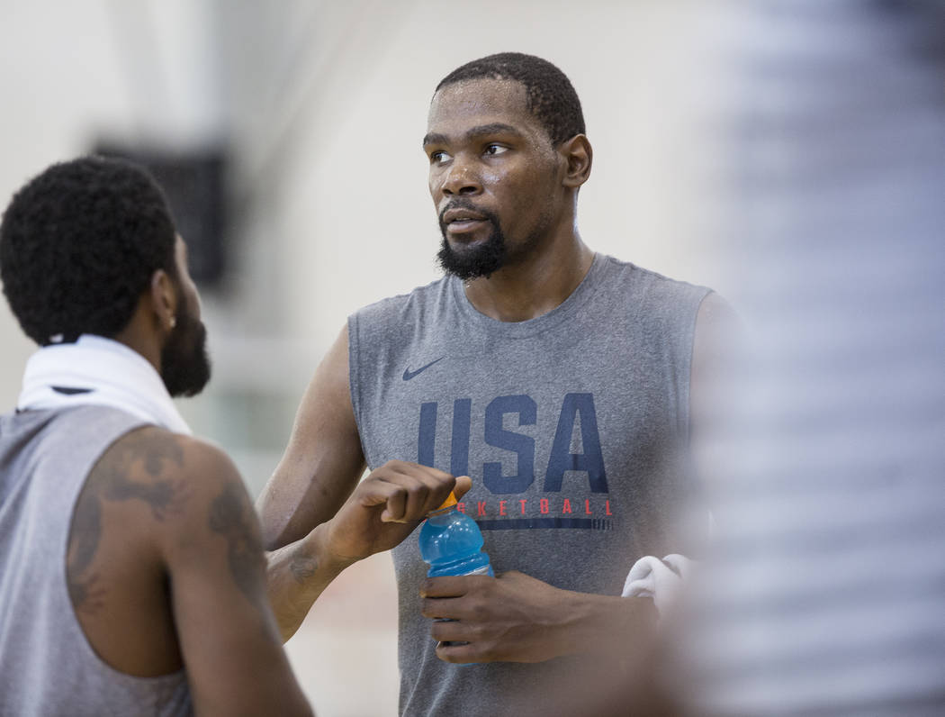 Golden State Warriors guard Kevin Durant (52) talks with teammates during Team USA basketball's minicamp on Friday, July 27, 2018, at the Mendenhall Center, in Las Vegas. Benjamin Hager Las Vegas ...