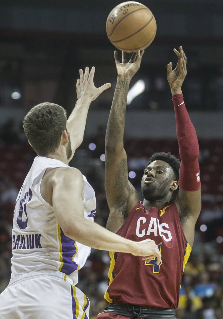Cleveland Cavaliers forward Jamel Artis (4) shoots over Los Angeles Lakers forward Sviatoslav Mykhailiuk (10) in the first quarter during the NBA Summer League semifinals on Monday, July 16, 2018, ...