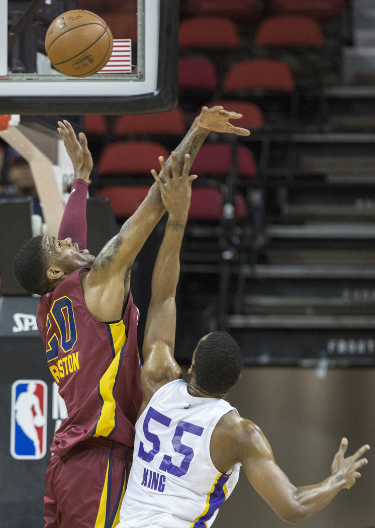 Cleveland Cavaliers forward Billy Preston (20) blocks the shot of Los Angeles Lakers guard Nick King (55) in the first quarter during the NBA Summer League semifinals on Monday, July 16, 2018, at ...