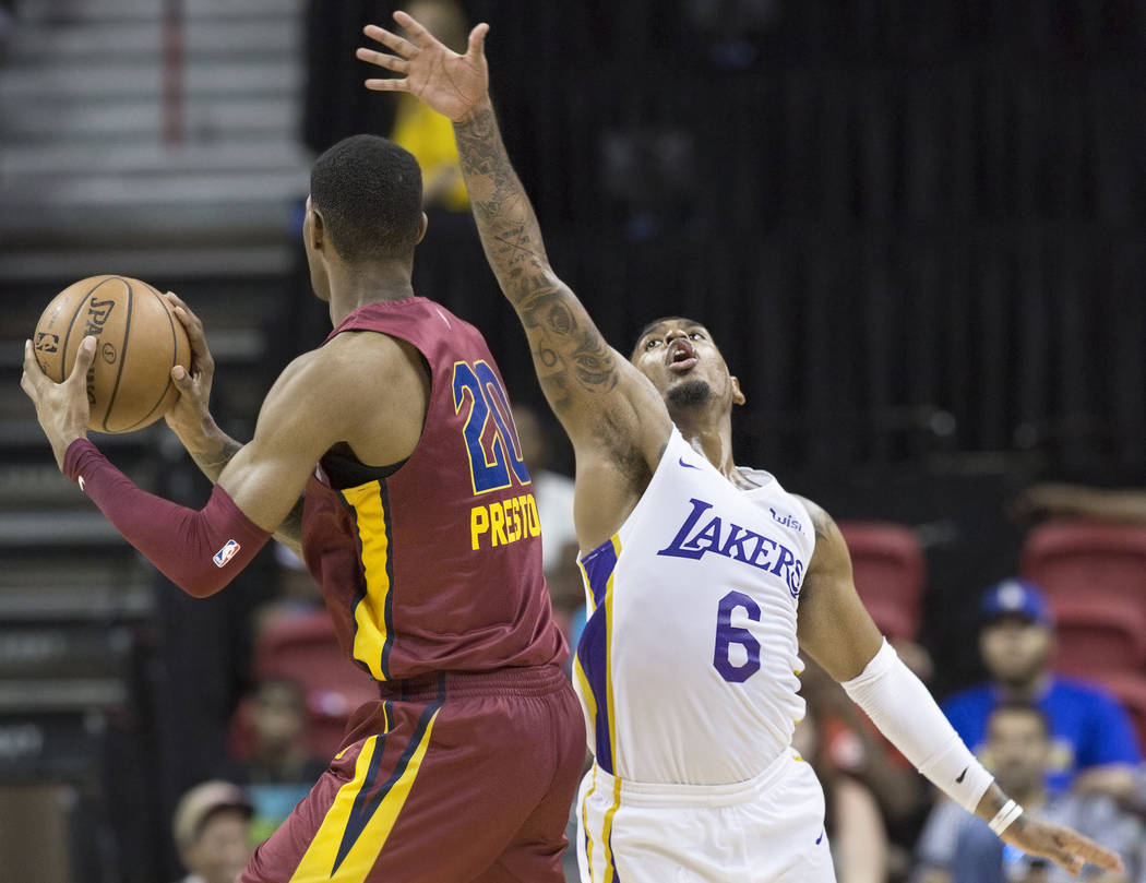 Los Angeles Lakers guard Xavier Rathan-Mayes (6) defends Cleveland Cavaliers forward Billy Preston (20) in the fourth quarter during the NBA Summer League semifinals on Monday, July 16, 2018, at t ...