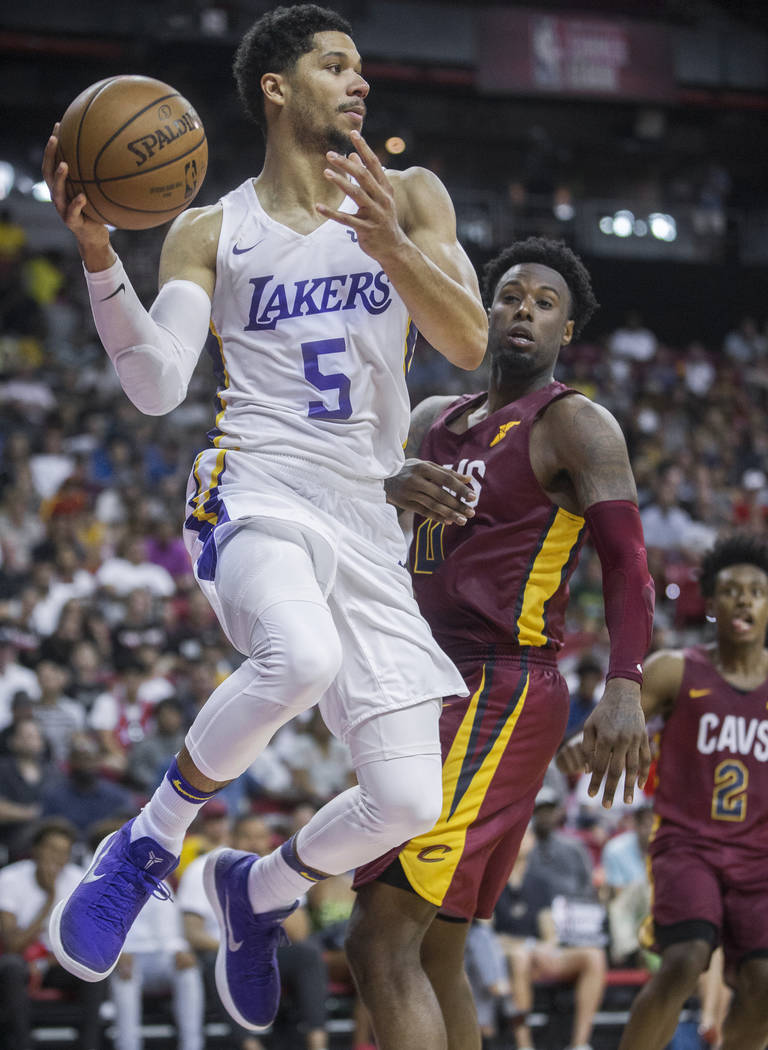 Los Angeles Lakers guard Josh Hart (5) drives baseline past Cleveland Cavaliers forward Jamel Artis (4) in overtime during the NBA Summer League semifinals on Monday, July 16, 2018, at the Thomas ...