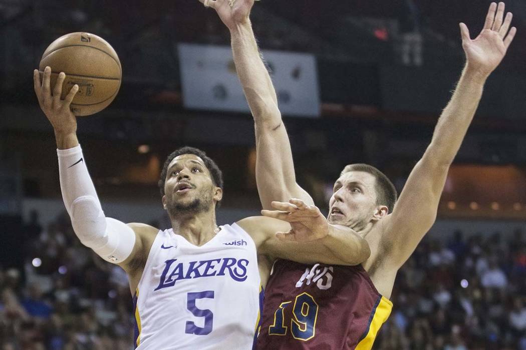 Los Angeles Lakers guard Josh Hart (5) drives past Cleveland Cavaliers forward Vladimir Brodziansky (19) in overtime during the NBA Summer League semifinals on Monday, July 16, 2018, at the Thomas ...