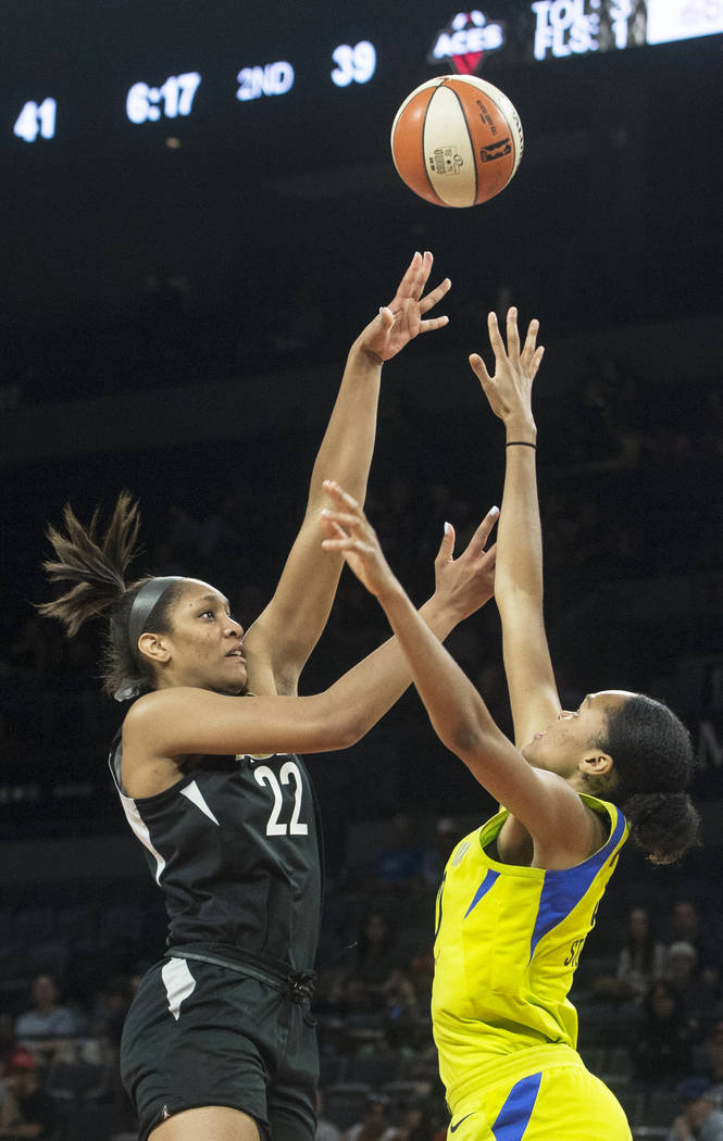 Aces center A'ja Wilson (22) shoots a jump shot over Dallas Wings forward Azurá Stevens (30) in the 2nd quarter on Wednesday, June 27, 2018, at the Mandalay Bay Events Center, in Las Vegas. B ...
