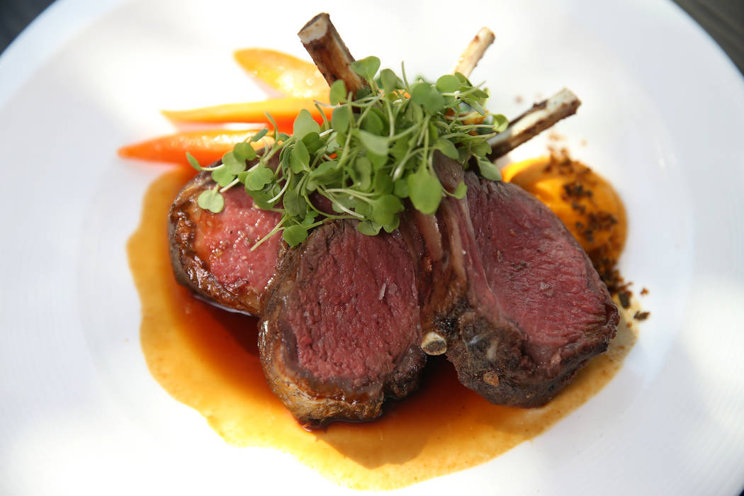 The roasted rack of lamb is served with vadouvan carrots, bloomsdale spinach and harissa lamb jus, at Gordon Ramsay Hell's Kitchen in Las Vegas, Tuesday, July 17, 2018. Erik Verduzco Las Vegas Rev ...
