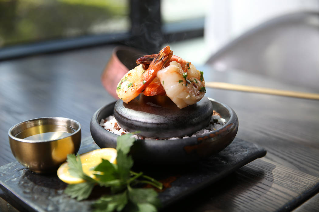 The scampi prawn flambe is served with garlic white wine sauce and drawn butter, at Gordon Ramsay Hell's Kitchen in Las Vegas, Tuesday, July 17, 2018. Erik Verduzco Las Vegas Review-Journal @Erik_ ...