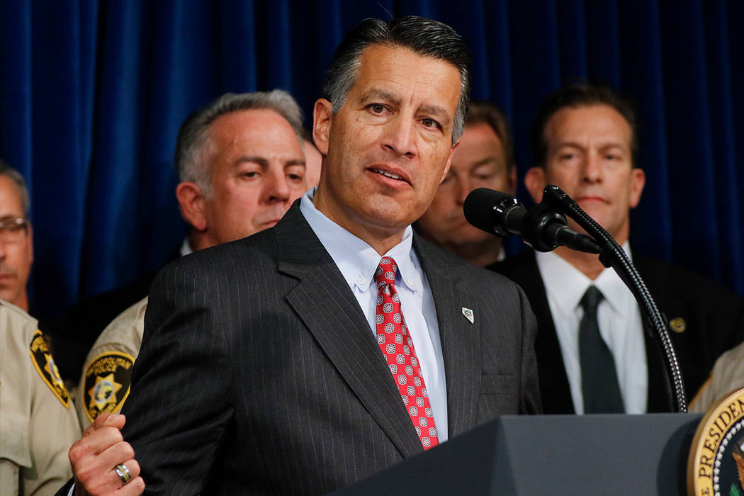 Gov. Brian Sandoval speaks at Metropolitan Police Department headquarters in Las Vegas on Wednesday, Oct. 4, 2017. (Chase Stevens/Las Vegas Review-Journal) @csstevensphoto