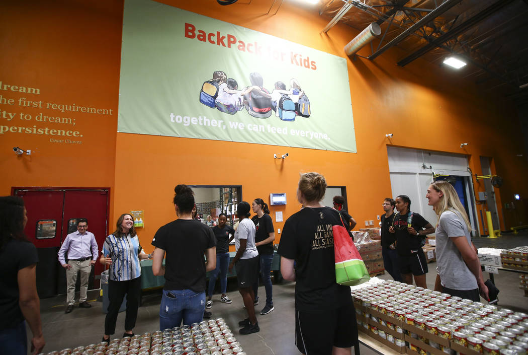 Players and staff of the Las Vegas Aces tour the Three Square food bank before packaging food for people in need in Las Vegas on Tuesday, July 17, 2018. Chase Stevens Las Vegas Review-Journal @css ...