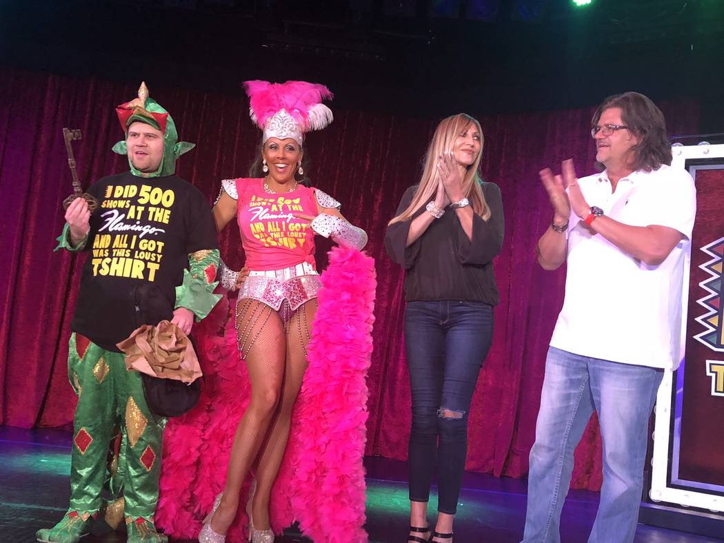 John Van der Put as Piff the Magic Dragon, Jade Simone and Angela and Matt Stabile are shown after the Stabiles presented him with the commemorative Key to the Dressing Room at Flamingo Las Vegas' ...