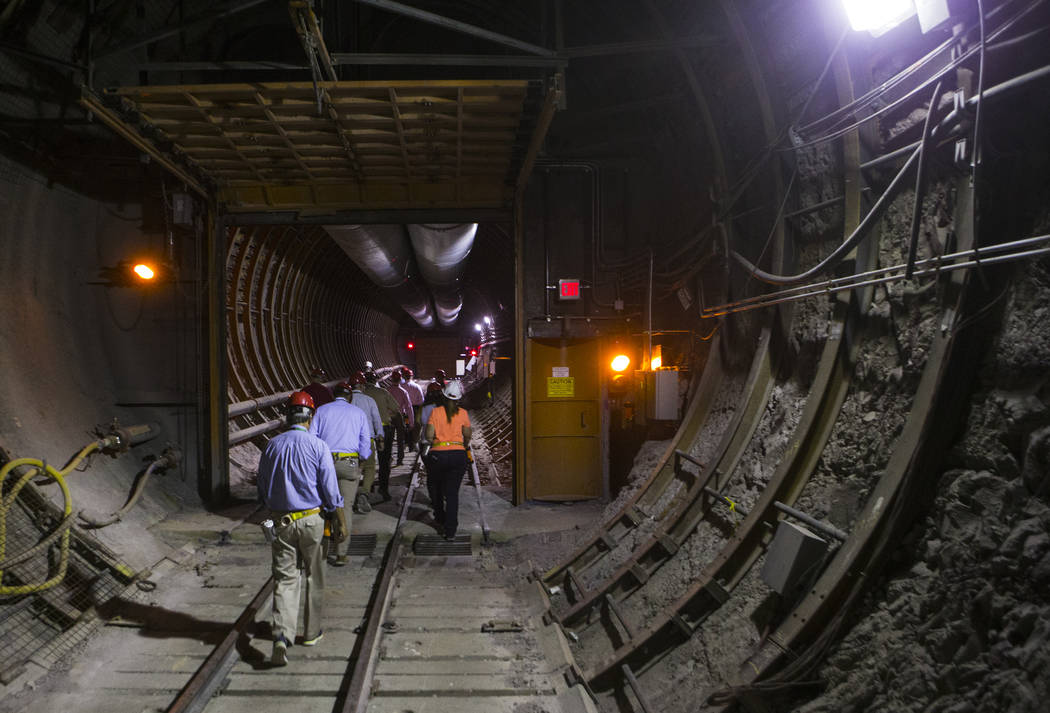 Members of a congressional tour make their way through the south portal of Yucca Mountain near Mercury on Saturday, July 14, 2018. Chase Stevens Las Vegas Review-Journal @csstevensphoto