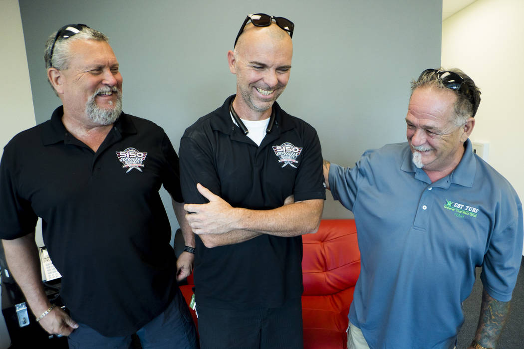 John Hastings, left, and Elliott Nail are co-owners of 5150 Wraps, and Perry Warren is president of marketing and sales at Got Turf, Monday, July 9, 2018. (Marcus Villagran/Las Vegas Review-Journa ...