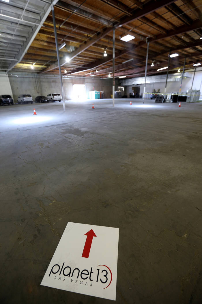 Signs direct guests to an event at the under-construction Planet 13 Superstore dispensary, a cannabis entertainment complex at 2548 W. Desert Inn Road in Las Vegas, Thursday, July 19, 2018. Compan ...