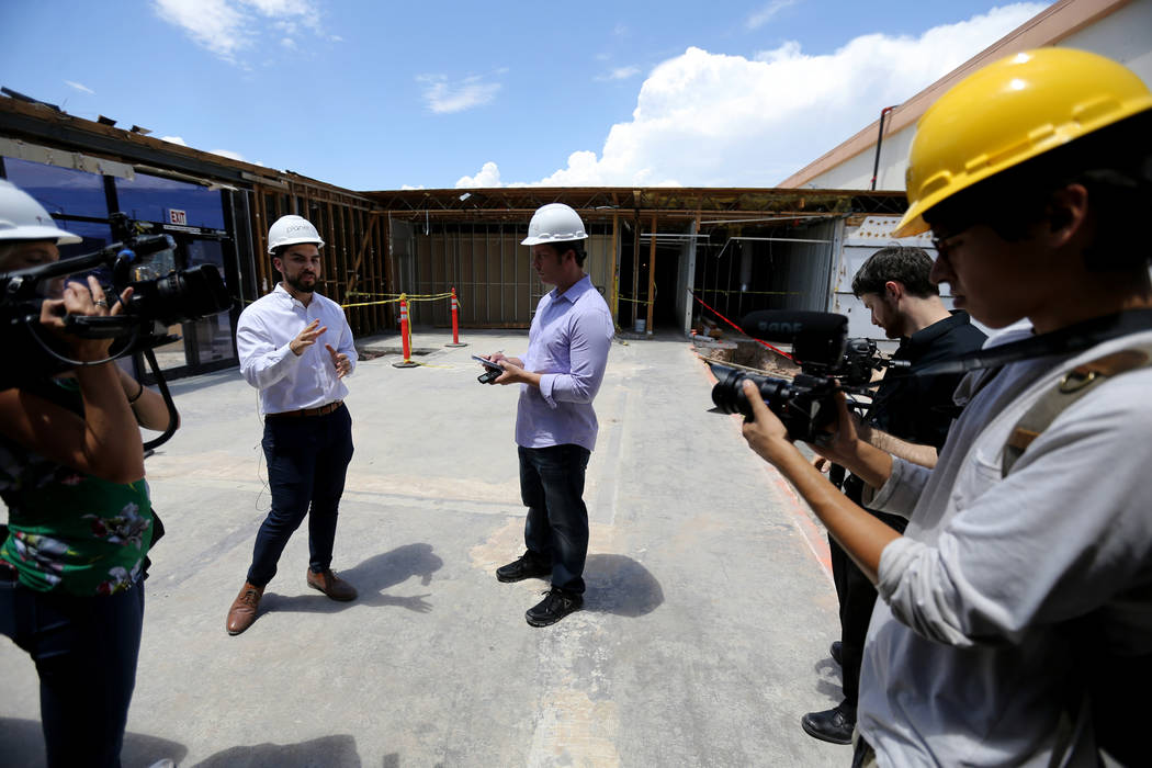 Director of Marking David Farris, second from left, leads a tour during an event at the under-construction Planet 13 Superstore dispensary, a cannabis entertainment complex at 2548 W. Desert Inn R ...