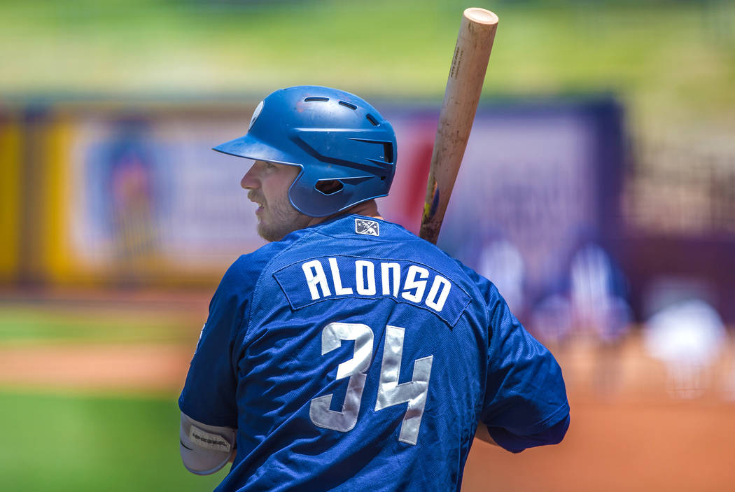 51s first baseman Peter Alonso warms up before his at bat during Las Vegas' home matchup with the Reno Aces on Sunday, June 24, 2018, at Cashman Field, in Las Vegas. Benjamin Hager Las Vegas Revie ...