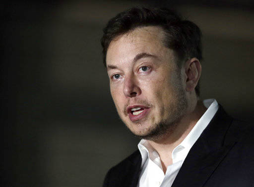FILE - In a Thursday, June 14, 2018 file photo, Tesla CEO and founder of the Boring Company Elon Musk speaks at a news conference, in Chicago. Whether it’s investors betting against his sto ...
