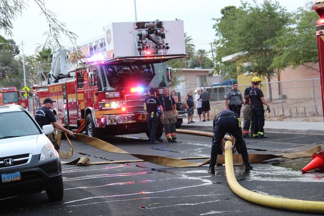 Firefighters responded to a house fire about 5:30 a.m., July 20, 2018, at 4911 Carmen Blvd. Seven people were displaced. (Max Michor/Las Vegas Review-Journal)