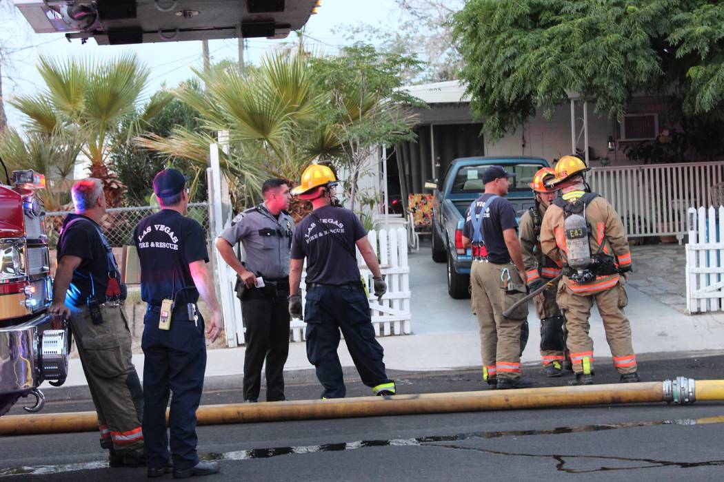 Firefighters responded to a house fire about 5:30 a.m., July 20, 2018, at 4911 Carmen Blvd. Seven people were displaced. (Max Michor/Las Vegas Review-Journal)