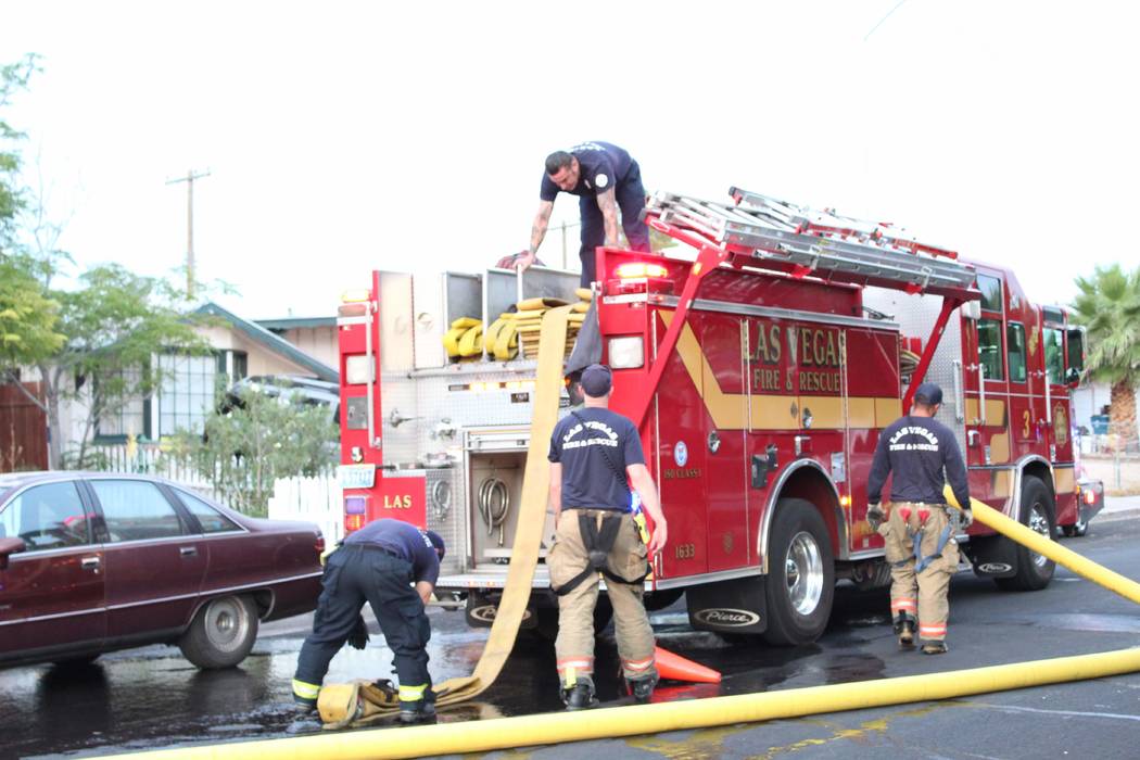 Firefighters responded to a house fire about 5:30 a.m., July 20, 2018, at 4911 Carmen Blvd. Seven people were displaced. (Max Michor/Las Vegas Review-Journal)