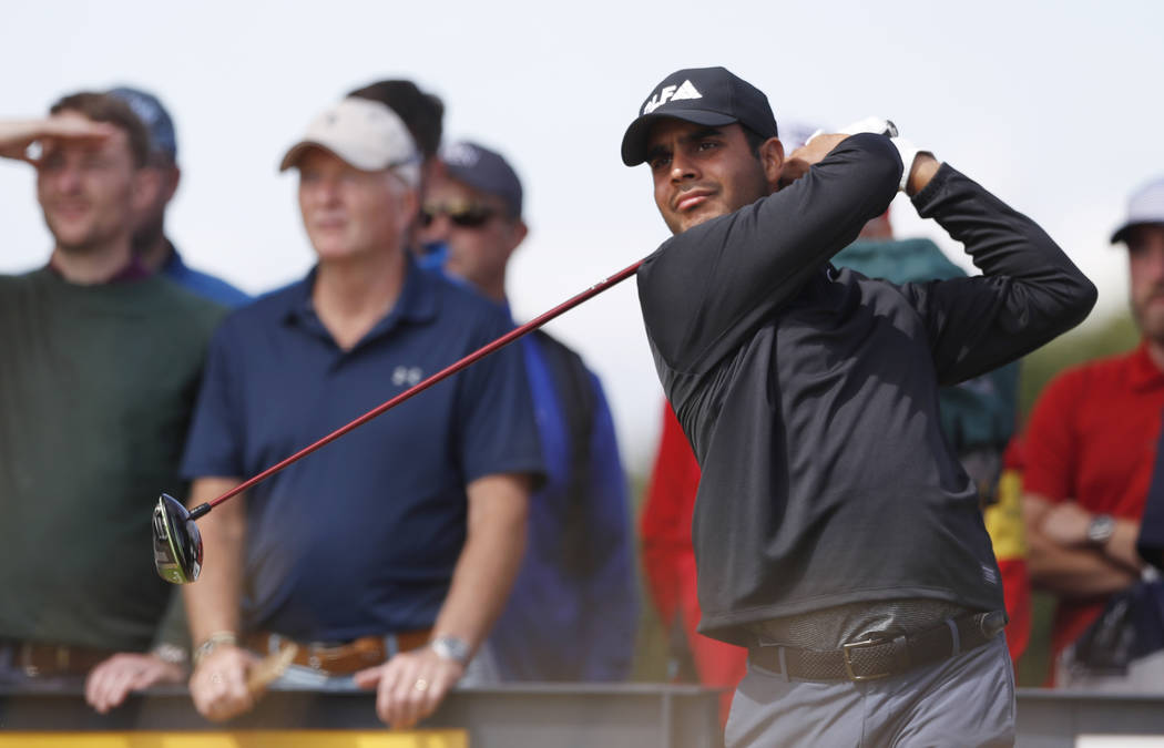 Shubhankar Sharma of India plays off the 10th tee during a practice round ahead of the British Open Golf Championship in Carnoustie, Scotland, Wednesday July 18, 2018. (AP Photo/Alastair Grant)