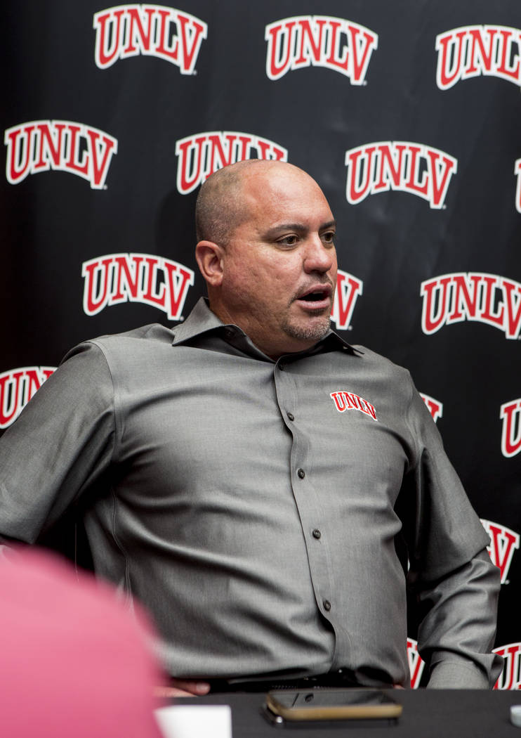 UNLV head football coach Tony Sanchez does an interview with multiple print media outlets during the Mountain West Football Media Summit at the Cosmopolitan hotel-casino in Las Vegas, July 25, 201 ...