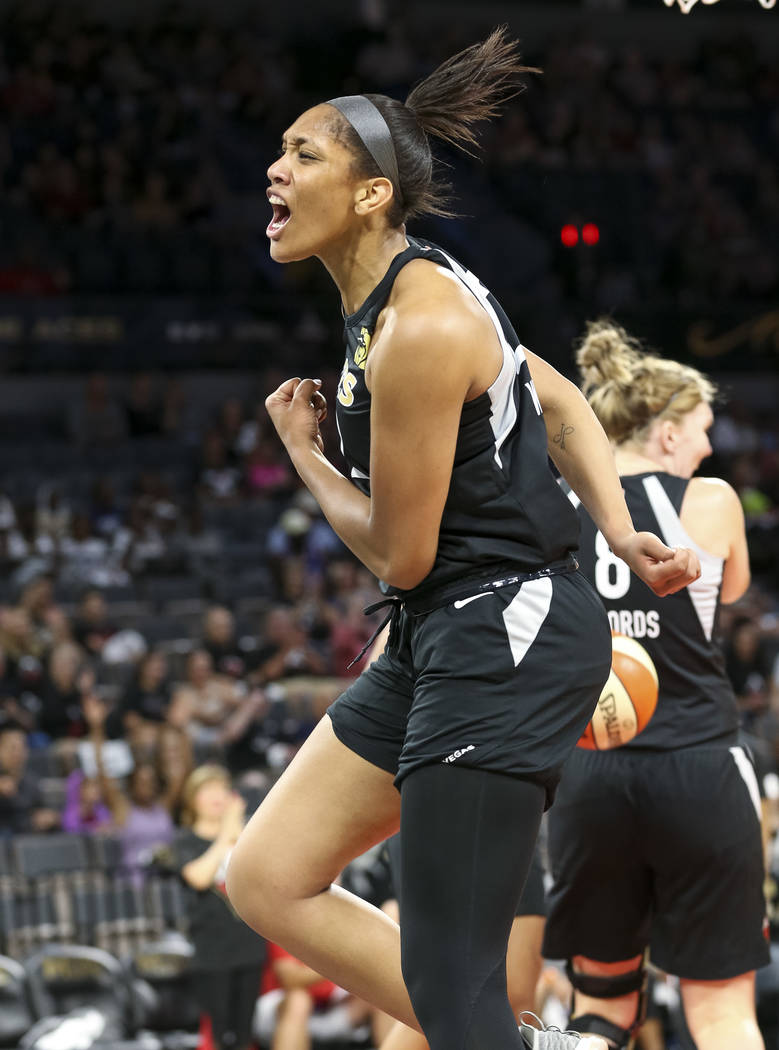 Las Vegas Aces center A'ja Wilson (22) reacts after getting fouled during the first half of a WNBA basketball game against the Indiana Fever at the Mandalay Bay Events Center in Las Vegas on Sunda ...
