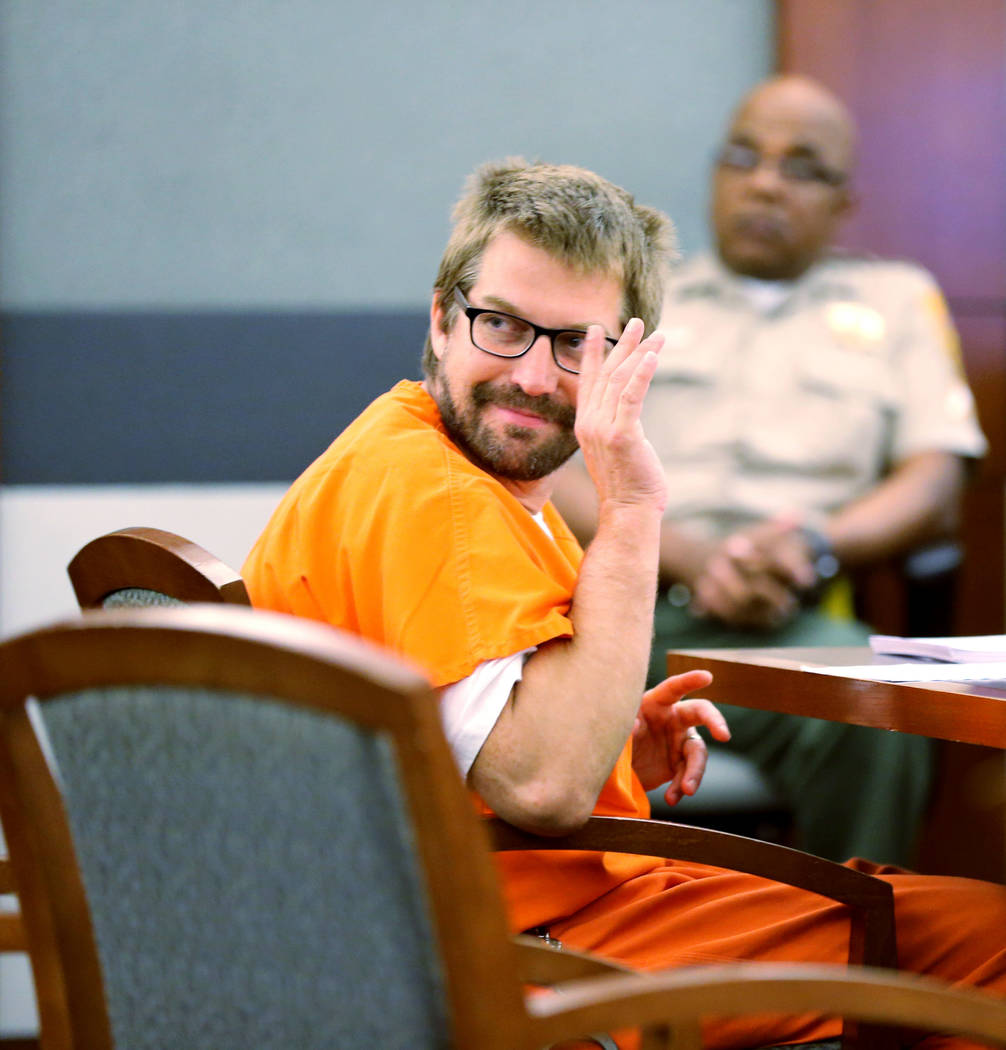 Jeremy Strohmeyer, who sexually assaulted and killed 7-year-old Sherrice Iverson in a Primm casino restroom 21 years ago, waves to his family during a hearing at the Regional Justice Center on Thu ...
